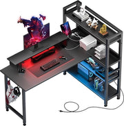 Biblioteca da gioco 55" con formazione L, scrivania per computer da casa con porta di ricarica desktop, 4 livelli di pannelli, angolo con sostegno per monitor, illuminazione LED, tavolo da gioco - nero