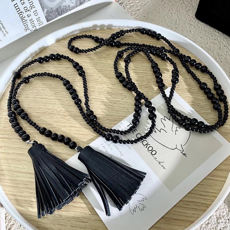 Collana lunga vintage con perline nere e nappa, regalo di Natale o compleanno.