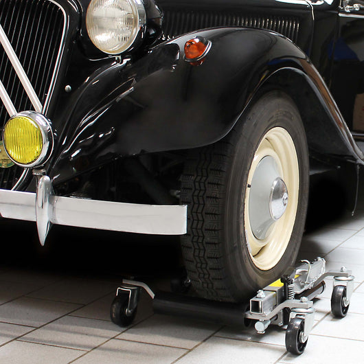 Set con supporto per 4x carrelli sposta auto e 4x carrelli di ausilio alla manovra con cric idraulico per max 680kg l'uno e gomme fino a 30cm