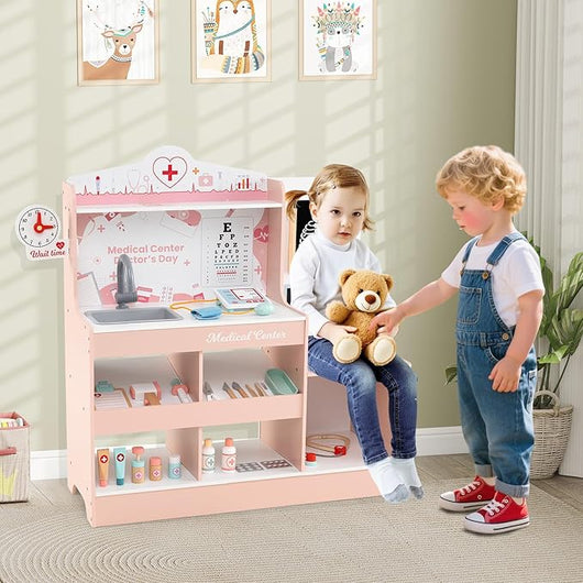 Set da Gioco Dottore in Legno, Centro Medico per Bambini con Orologio, Lavandino, Tabella Oculistica, Monitor ECG, Area Esame e 24 Accessori Giocattolo, 97 × 30,5 × 88 cm (Rosa)