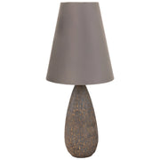Lampada da tavolo in poliresina dorata