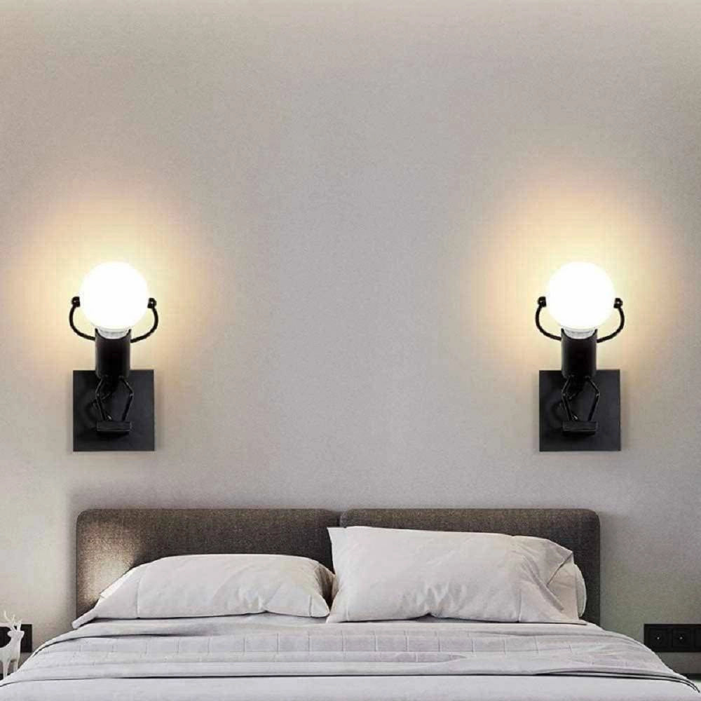 Trade Shop - Applique Da Parete Decorativo Forma Omino Che Salta In Metallo Attacco E27 Aq50 - Nero