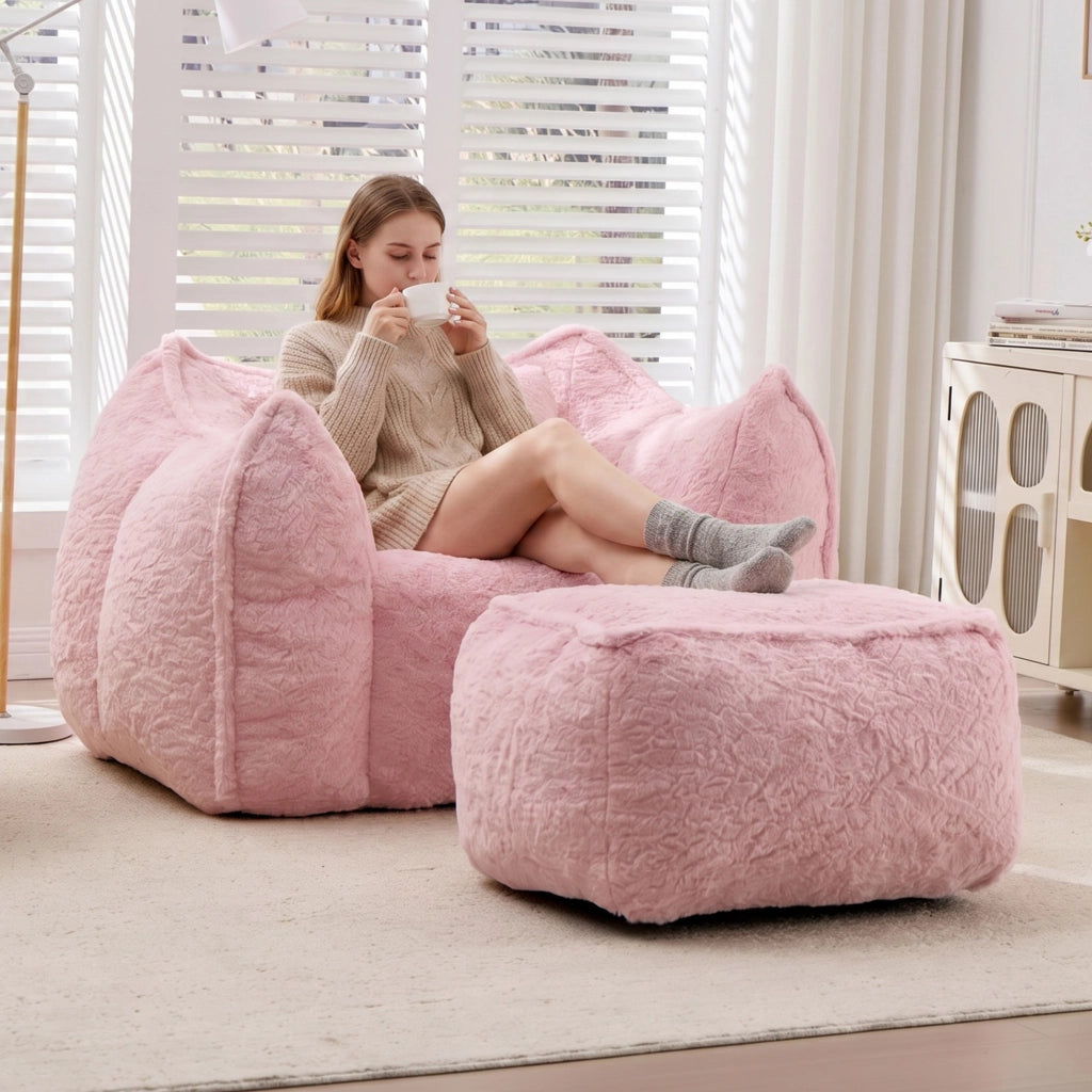 Pouf lounge ergonomico con schienale avvolgente e poggiapiedi per soggiorno e camera da letto in finta pelliccia rosa