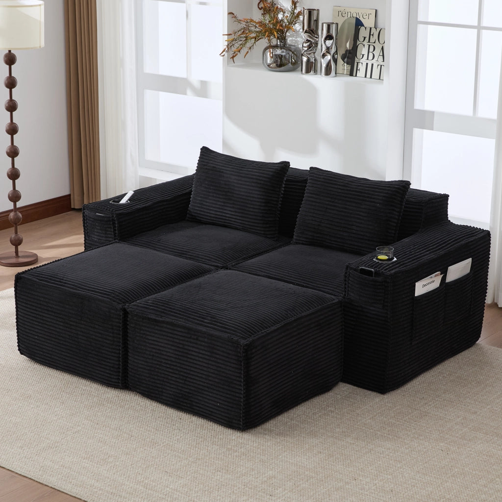 Divano modulare a 2 posti in tessuto corduroy nero con 2 pouf, portabicchieri e tasche laterali