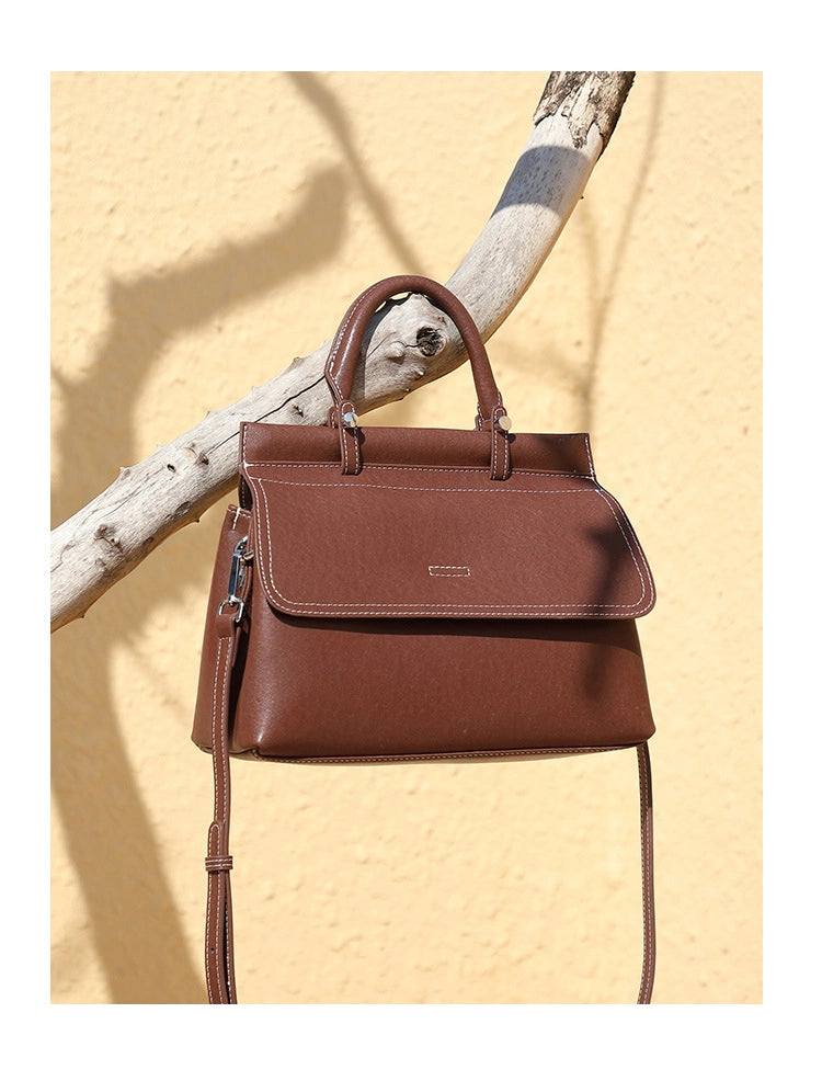 Borsa a mano da donna in vera pelle, colore marrone.