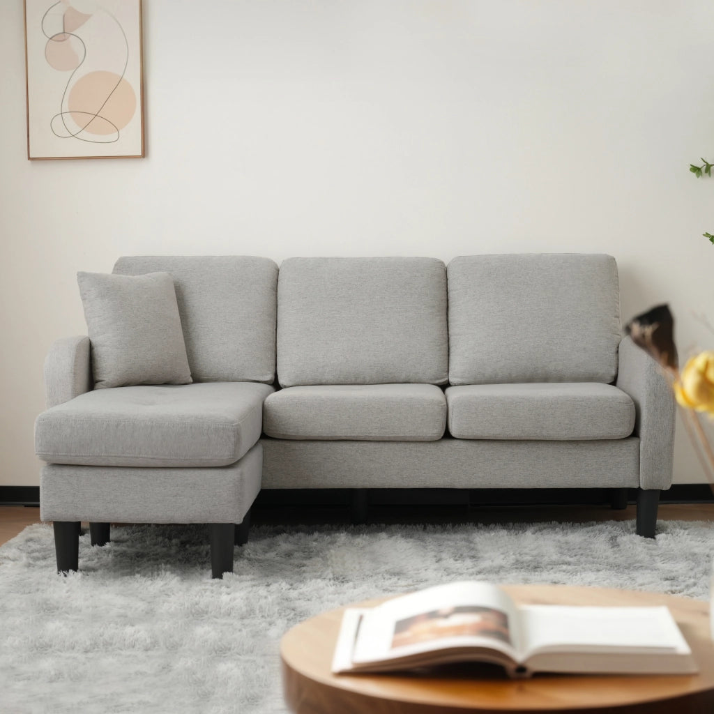 Divano angolare 3 posti con chaise longue reversibile e design modulare in tessuto grigio