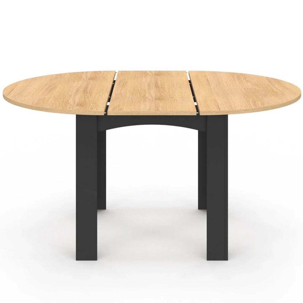 IDMarket - Tavolo da pranzo rotondo allungabile DONA nero con piano effetto faggio 110 - 150 cm e 6 sedie MILA in velluto nero