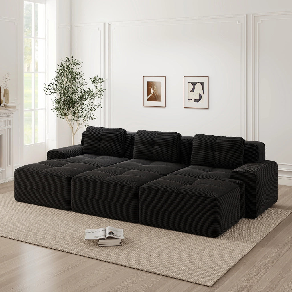 Divano modulare angolare in velluto a coste con funzione letto, seduta profonda e braccioli ampi nero
