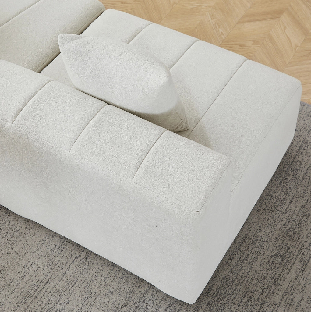Modulo divano curvo modulare in ciniglia beige con 2 cuscini