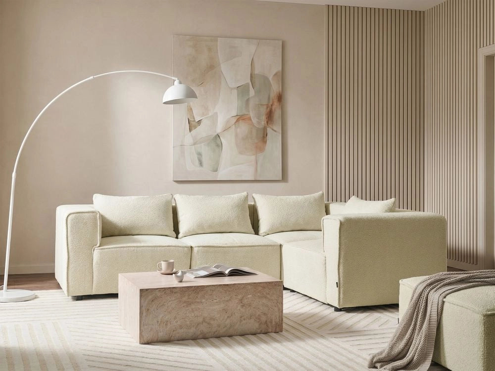 Divano a 4 posti in tessuto bouclè modulare bianco sporco lato sinistro stile minimale moderno