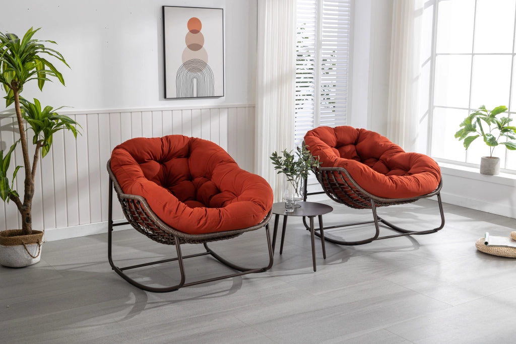 Rocking-chair in rattan sintetico con struttura in acciaio e seduta ergonomica per esterni arancione 78 × 106 × 90 cm