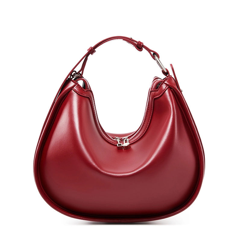 Borsa da donna alla moda in vera pelle, colore rosso.
