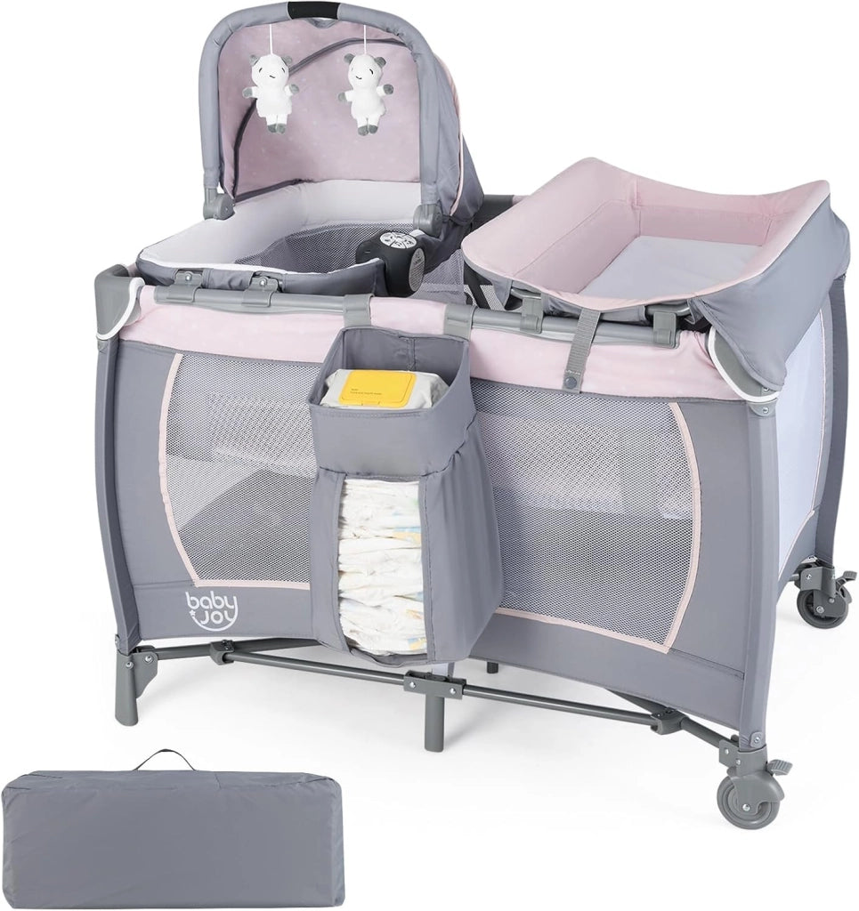 5 in 1 Culla Campeggio Bambini, Lettino Viaggio Neonati Pieghevole con Materasso, Fasciatoio, Box Portatile con Ruote, 2 Giocattoli e Carillon, per Bambini 0-3 Anni (Rosa)