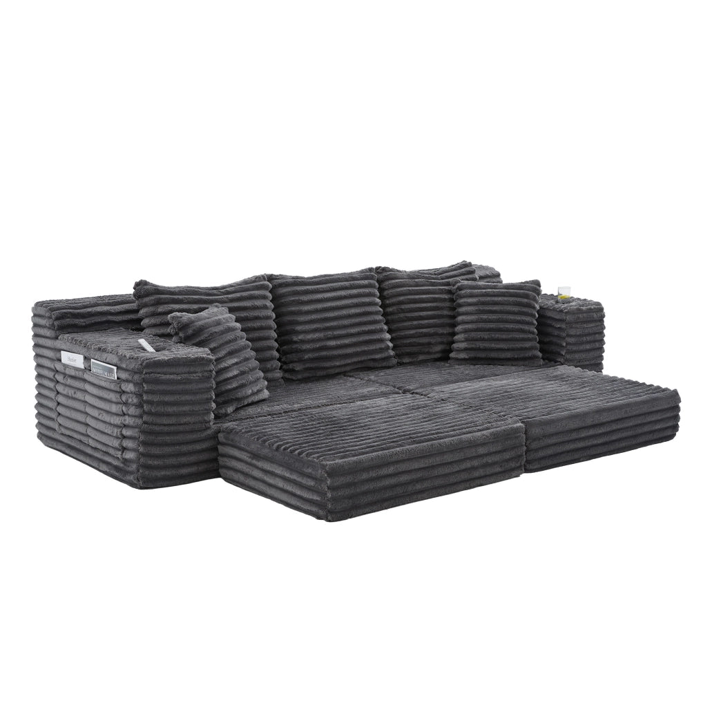 Divano in corduroy grigio scuro con schienale alto; cuscini extra; tasche laterali e portabicchieri; 273 cm