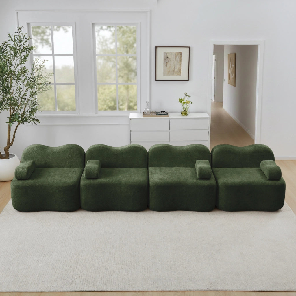 Divano modulare ad angolo in velluto verde 384x98x70 cm con seduta profonda e pouf collegabile