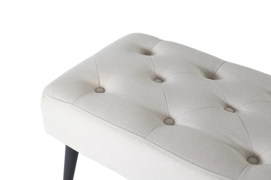 Panca in tessuto beige con gambe in ferro nero
