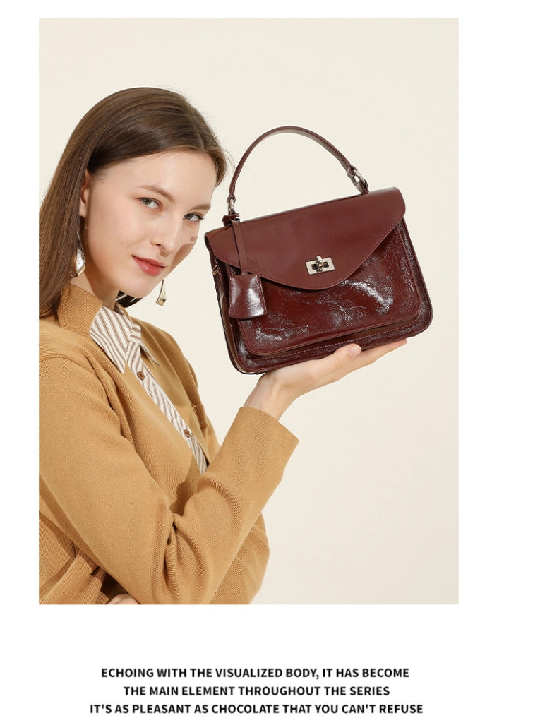 Borsa a tracolla da donna in vera pelle, modello tote/hobo, colore rosso.