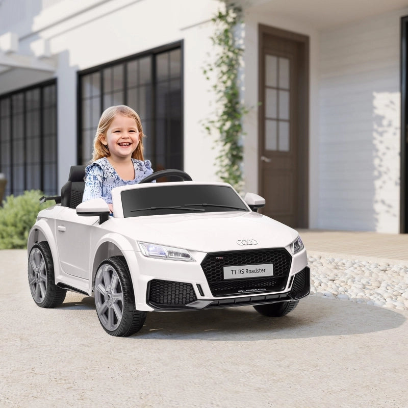 Auto elettrica per bambini, Audi TT RS Roadster, 3 km/h, telecomando, LED, USB, bianca