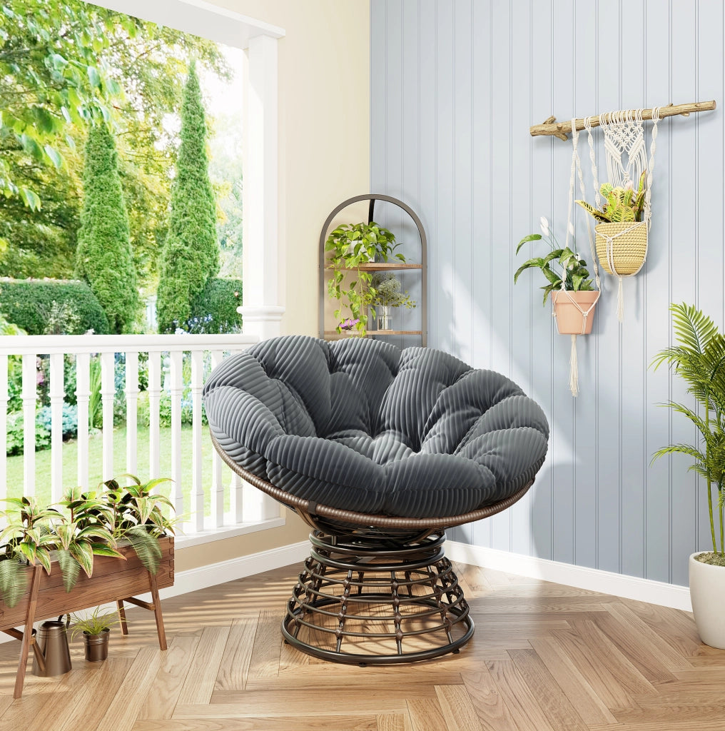 Poltrona Papasan girevole con cuscino grigio e struttura marrone