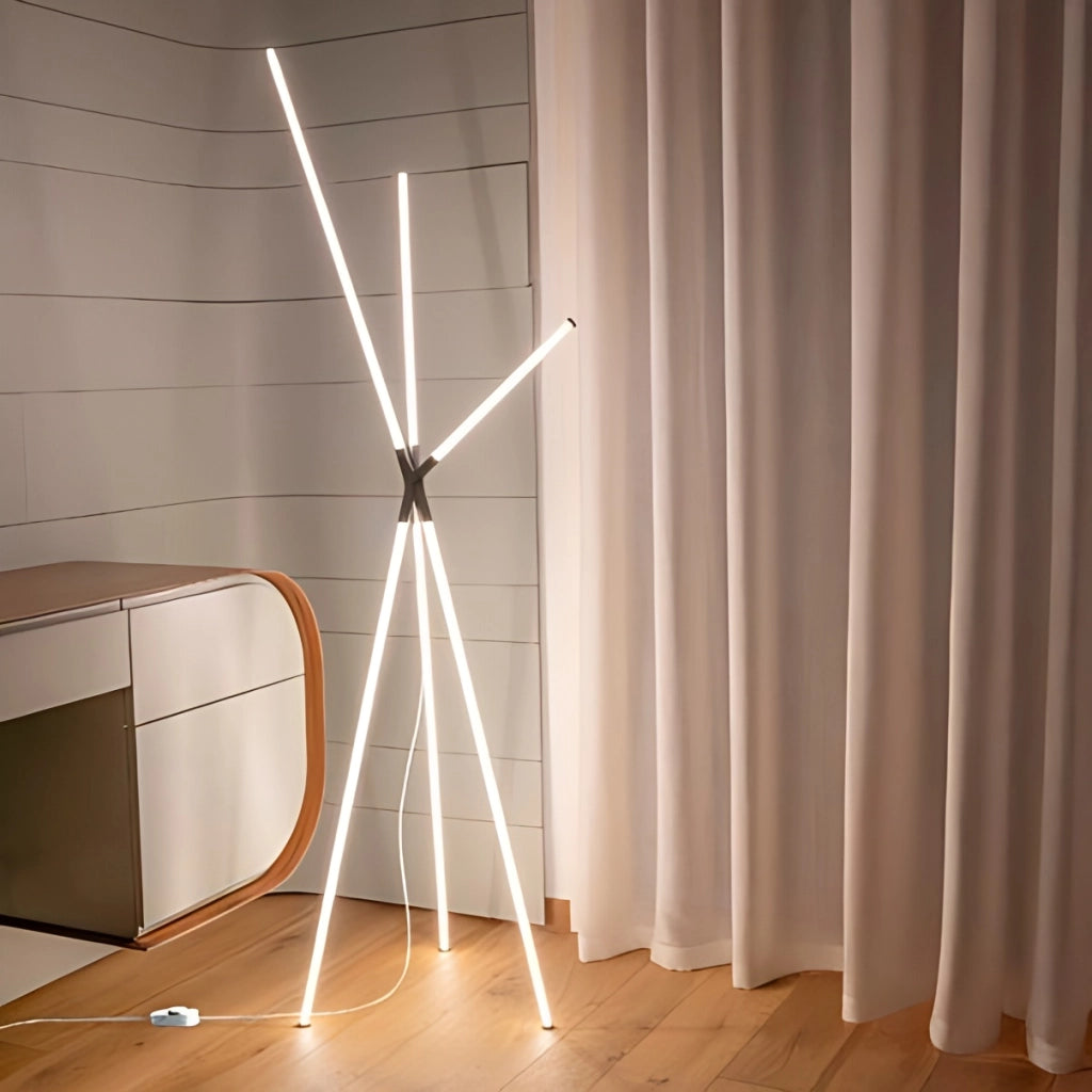 Brilliant Lampada da terra di design a treppiede con diffusori cilindrici in policarbonato e struttura in alluminio finitura Oro, tecnologia LED