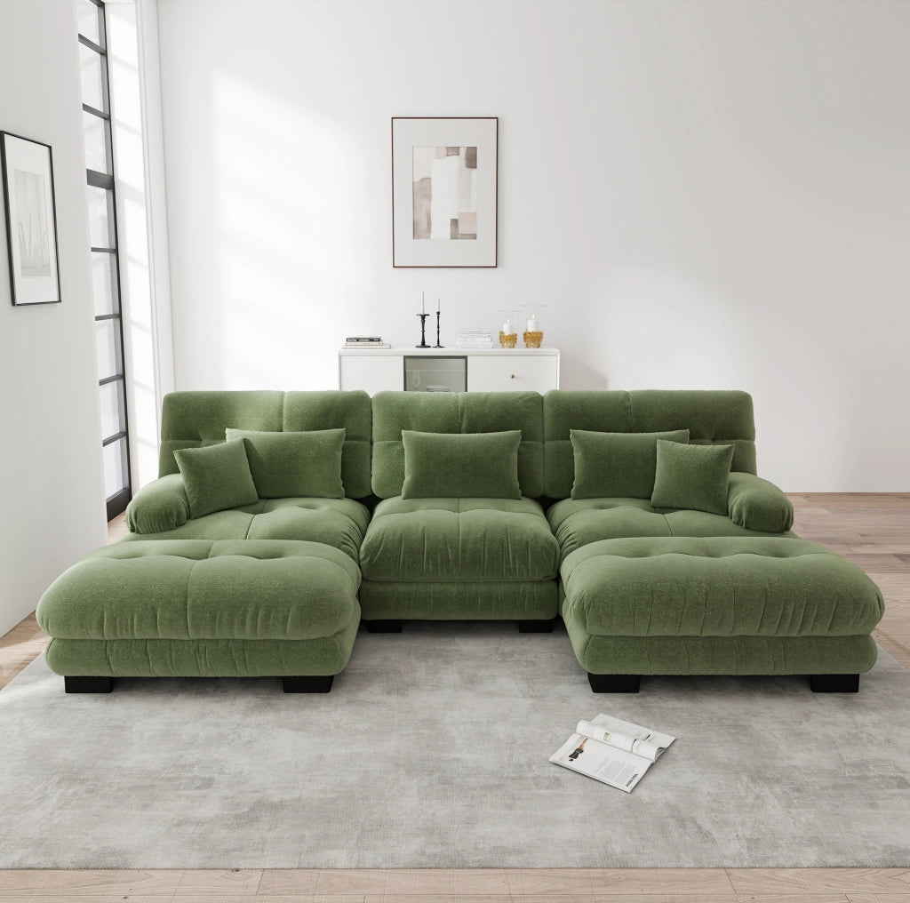 Divano modulare con ottomane mobili in chenille verde; configurazione a U o angolare
