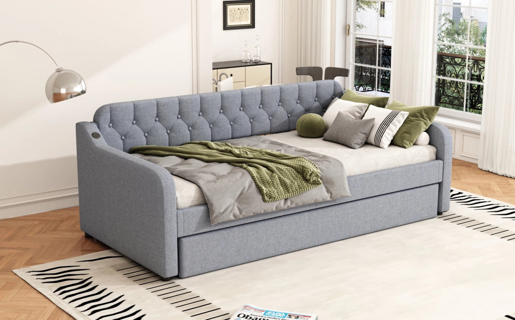 Divano letto grigio 90x200 cm con letto estraibile e porta USB