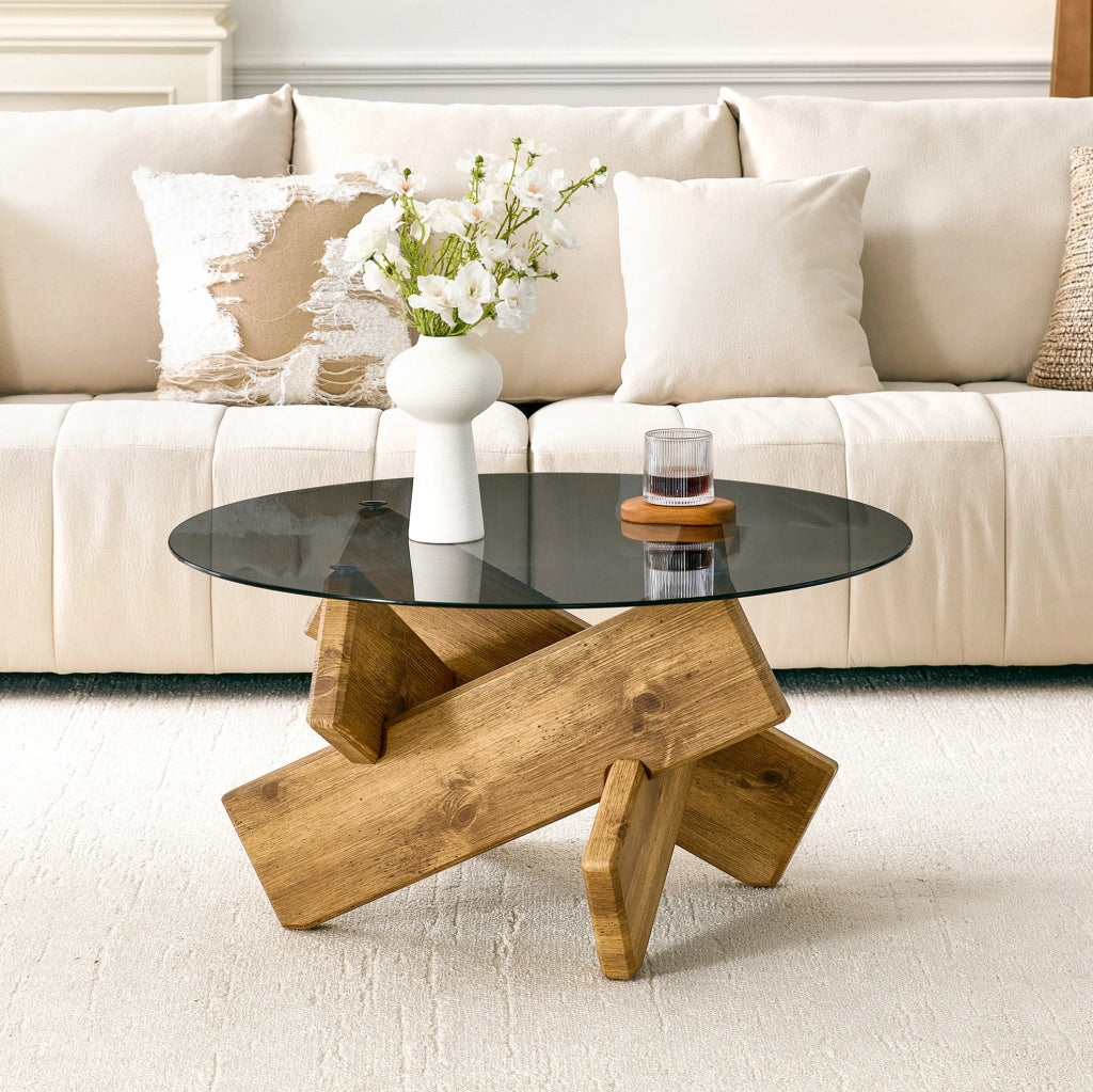 Tavolino rotondo 88.5x88.5x12.5 cm con piano in vetro temperato; base geometrica in MDF naturale
