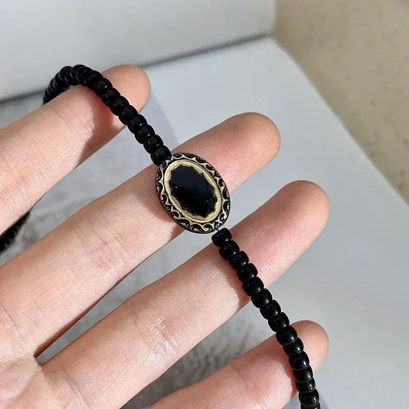 Collana vintage barocca con perline nere e oro, regalo di Natale o compleanno.
