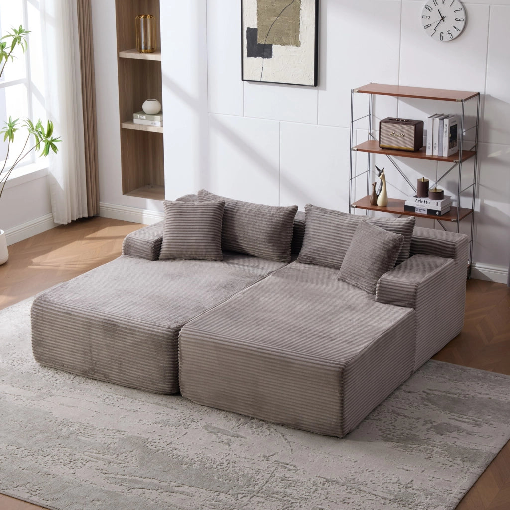Divano con chaise longue e cuscino in ciniglia grigio