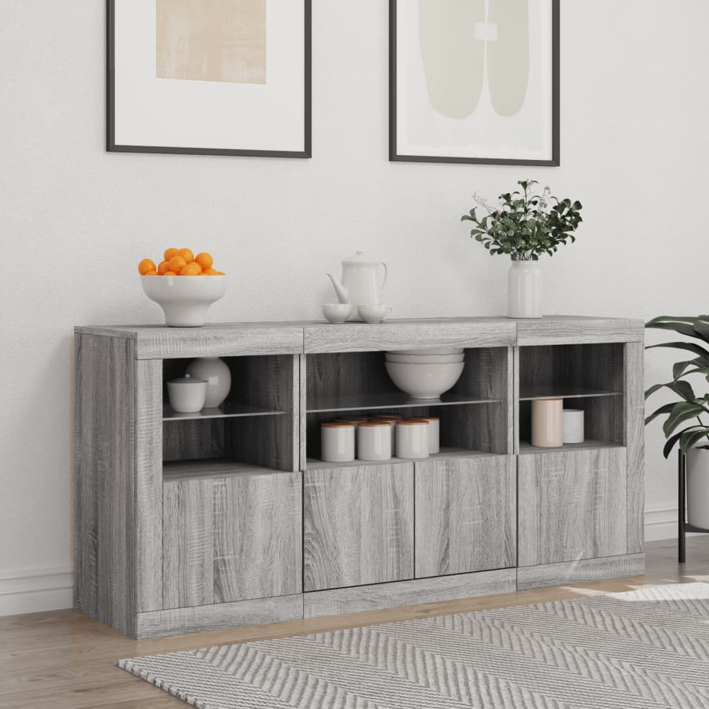 Credenza con Luci LED Grigio Sonoma 142,5x37x67 cm 3209070