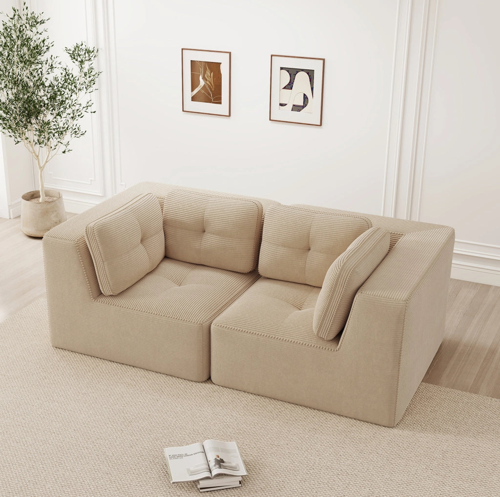 Divano angolare modulare beige in velluto a coste; senza struttura rigida