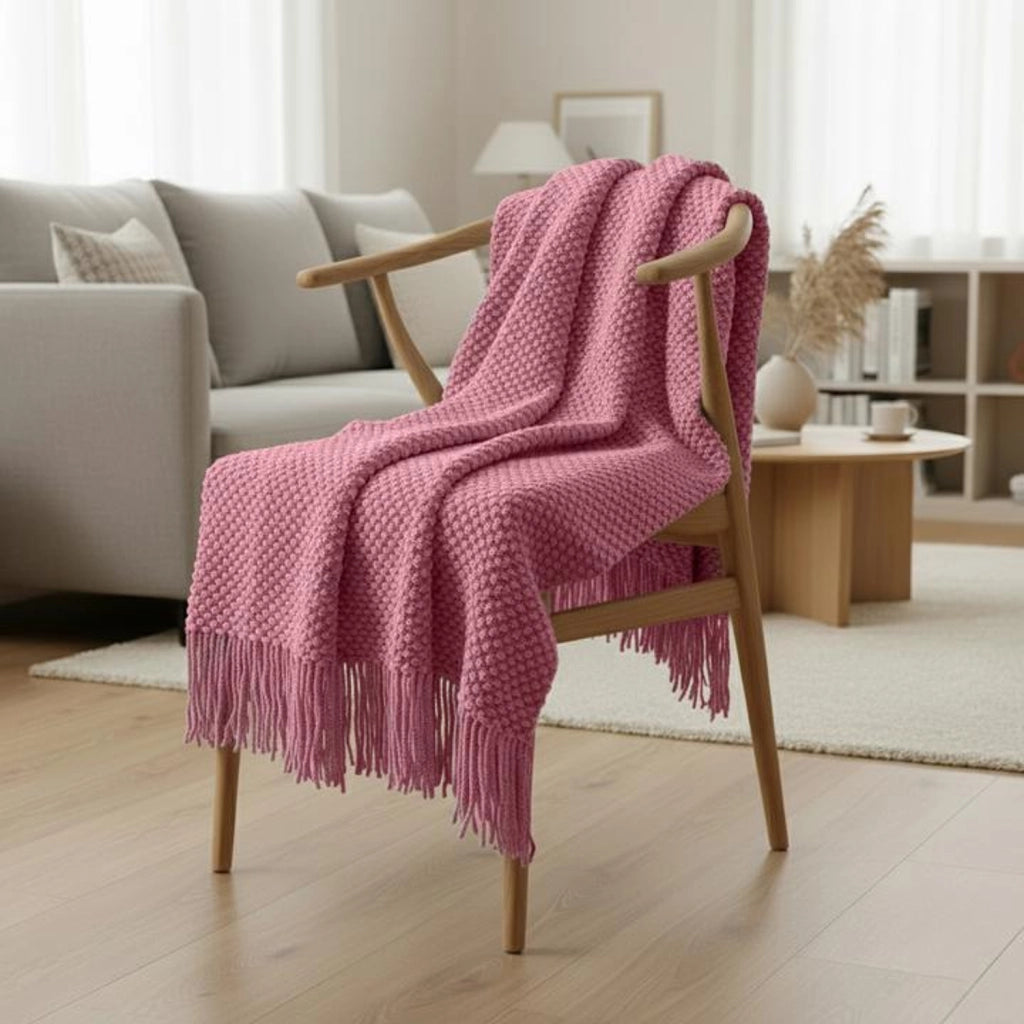 Coperta plaid rosa lampone testurizzata a nido d'ape e frangiata 180x220 cm