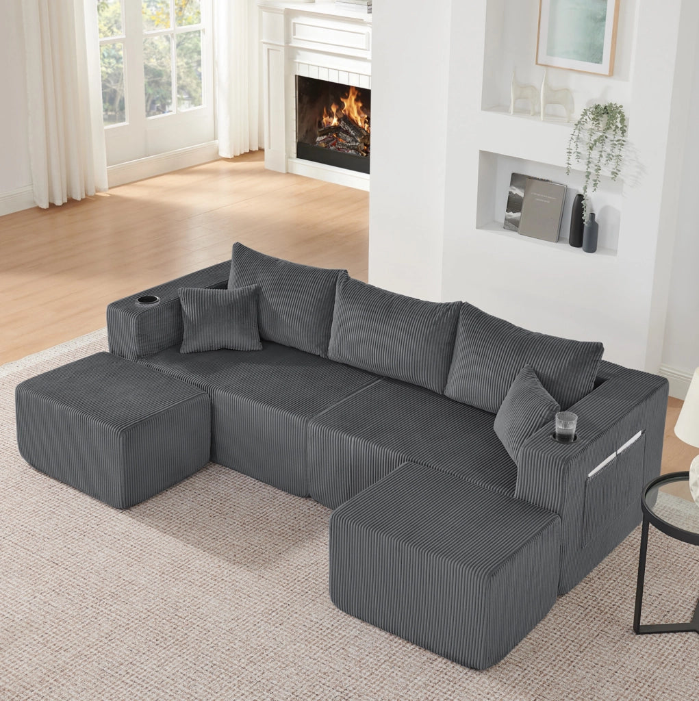 Divano angolare modulare 3 posti a L con 2 pouf mobili; tessuto effetto velluto a coste grigio