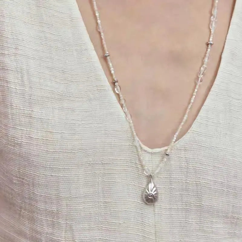 Collana di conchiglie con perline fatta a mano: un regalo vintage con gioielli in cristallo