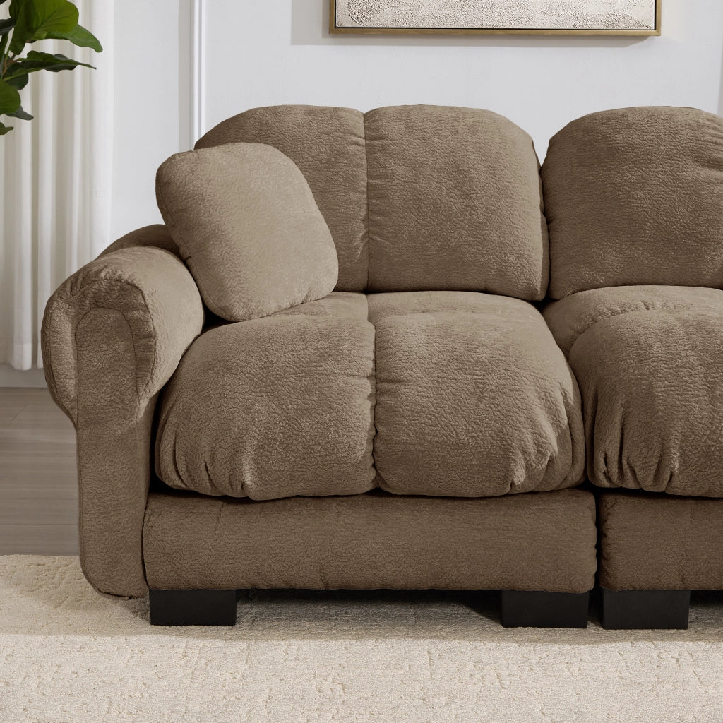 Divano modulare in ciniglia con cuscini trapuntati e seduta spessa, con pouf mobile marrone 190 × 149 × 90 cm