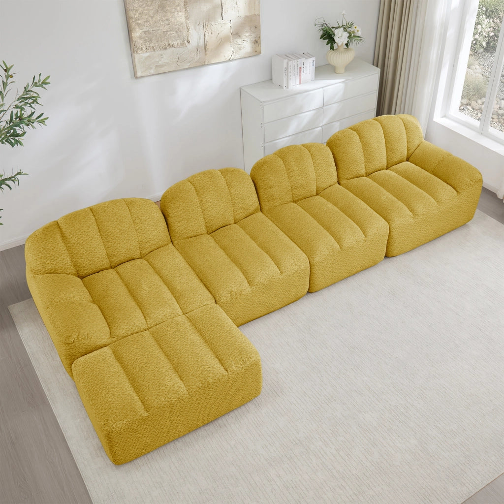 Divano angolare modulare 4 posti senza struttura con pouf, seduta ampia in pile granulato per soggiorno giallo