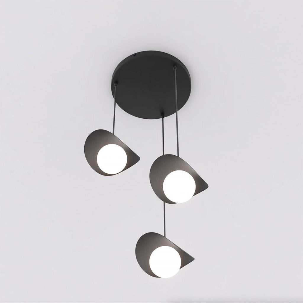 Lampada a sospensione Ritual a tre luci in acciaio nero e vetro