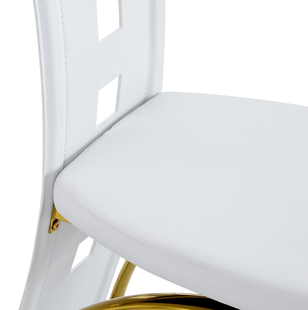 Set di 2 sedie da pranzo con schienale traforato; ecopelle PU bianca opaca e gambe dorate