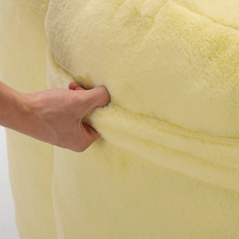 Poltrona pouf compatta a forma di loto con seduta morbida e leggera facile da spostare in tessuto peluche giallo