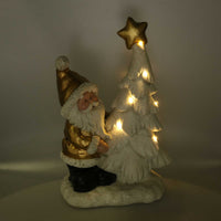 Babbo natale in resina con albero e led bianco e oro cm 29x17,5xh45