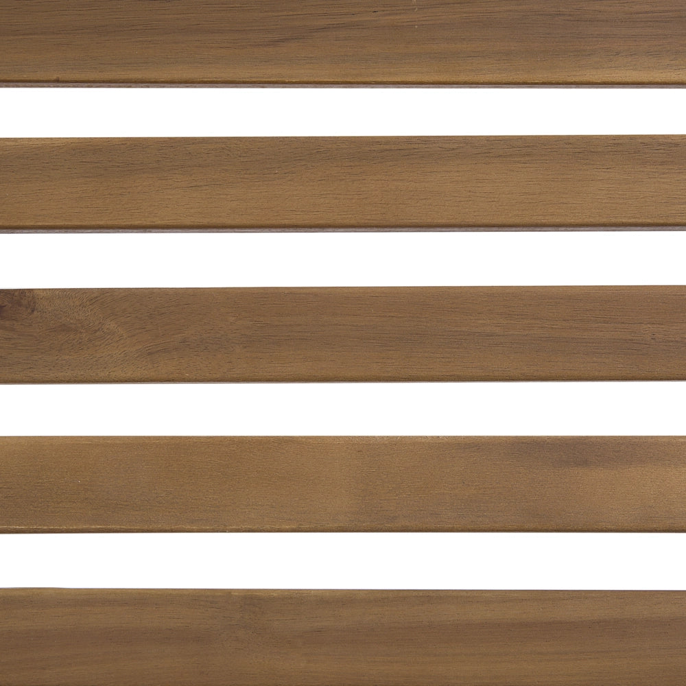 Lettino prendisole a doghe in legno di acacia chiaro con design a dondolo a forma curva con cuscino di seduta blu