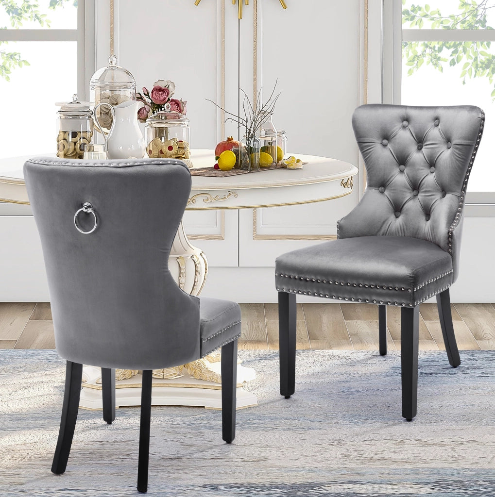 Set di 4 sedie da pranzo in velluto grigio con gambe in legno di gomma