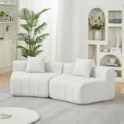 Divano modulare curvo in chenille beige con 2 cuscini, design ispirato ai tasti del pianoforte