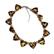 Collana con perle a forma di cuore grande e stampa leopardata, una lussuosa collana a forma di cuore