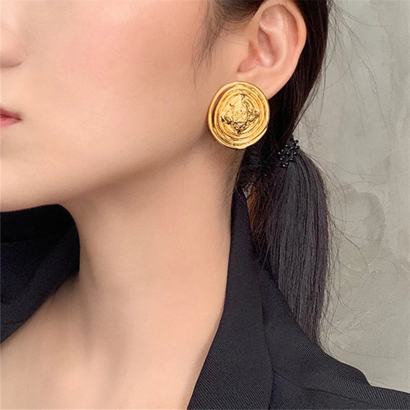 Orecchini a bottone vintage in metallo con ago in argento S925