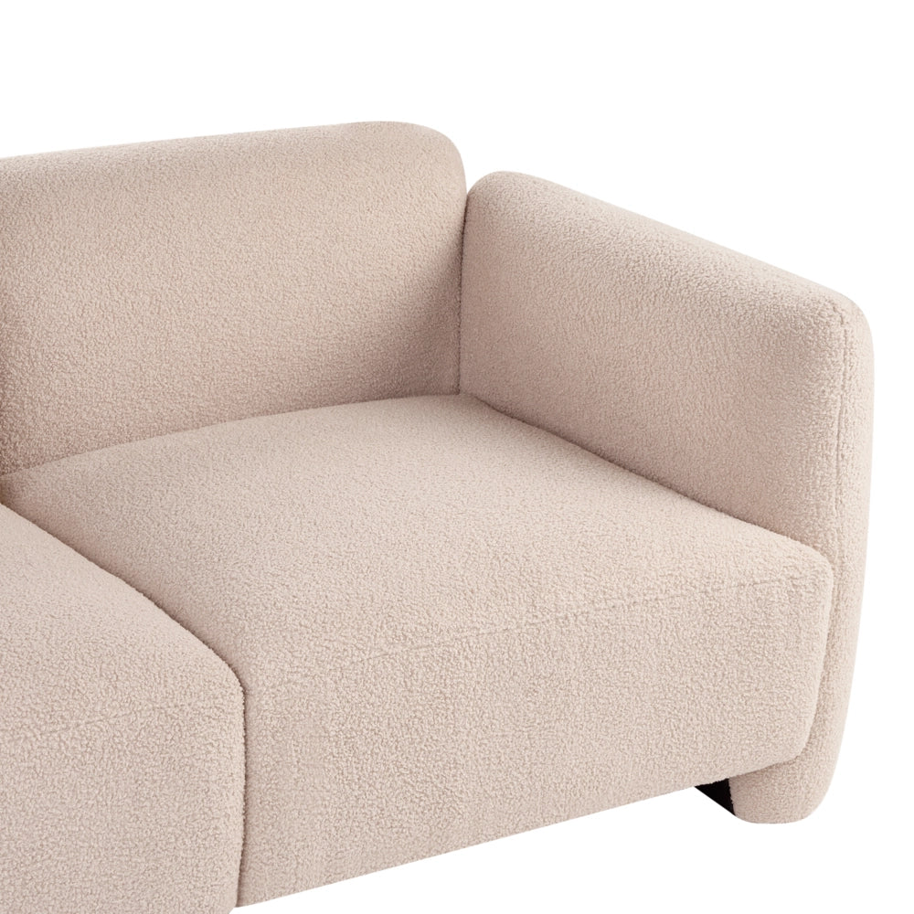Divano imbottito minimalista a profilo ribassato a 3 posti con seduta profonda bouclè beige stile minimalista