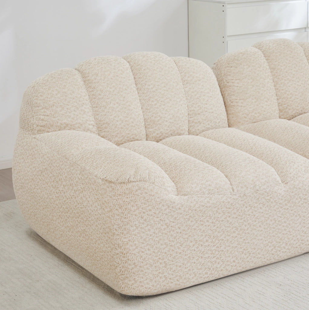 Divano modulare 3 posti con ottomana collegabile in fleece granulato; bianco beige