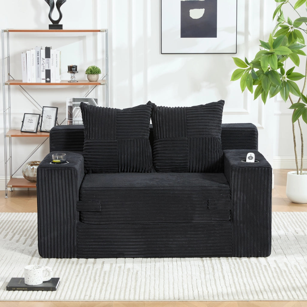 Pouf divano in velluto a coste nero 151x133x64 cm con tasche laterali e 2 cuscini