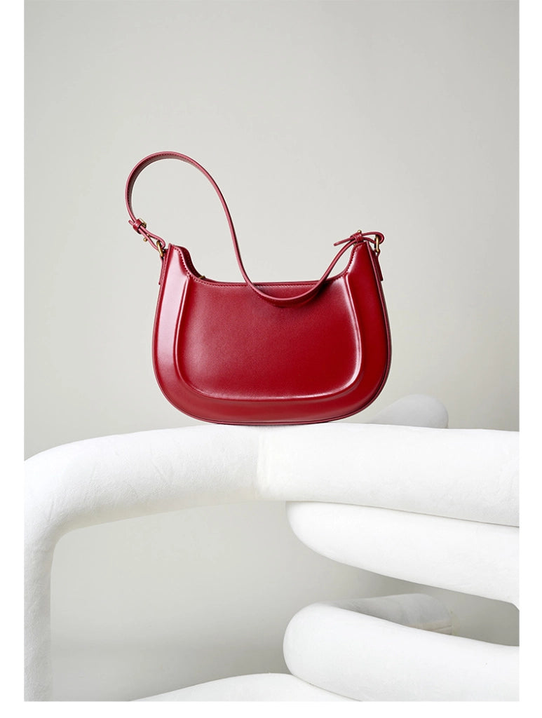 Borsa a tracolla da donna in vera pelle, modello Crescent, alla moda, colore rosso.