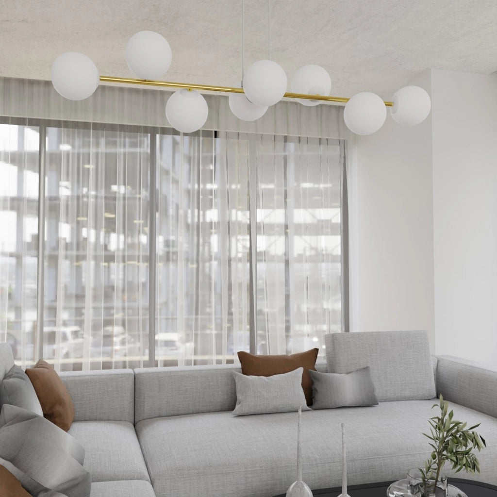 Lampada a sospensione Gravity con diffusori in vetro e dettagli oro